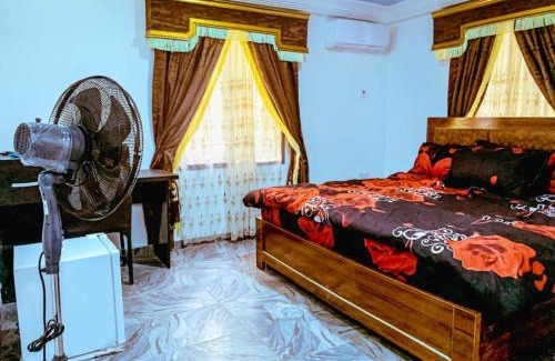 Abuja House | Select Winsome 1 Room, 1 King-sized Bed