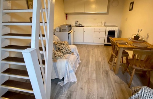 Winterbourne Earls Cottage | Self-catering, galleried studio cottage with parking outside