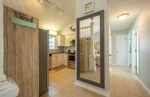 Ocean Isle Estates House | Semi-oceanfront dog-friendly home with private hot tub, decks & shared pool