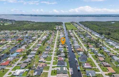 Fort Myers House | Serene canal, three bedrooms and a large pool! - Villa La Brisa Fresca
