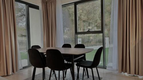 Dubai Villa | Serene Green Escape and Stunning Views in DAMAC Hills 1 by Bhavan Vacation Homes
