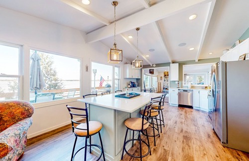 Three Lakes House | Serene lakefront retreat with wet bar, wraparound decks, dock, fireplaces, AC