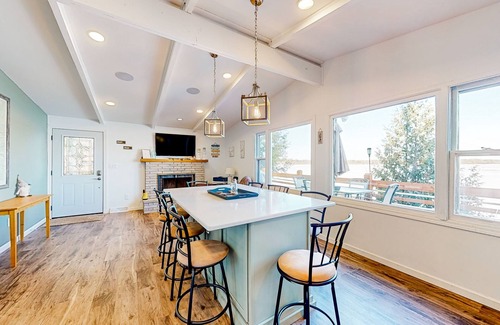 Three Lakes House | Serene lakefront retreat with wet bar, wraparound decks, dock, fireplaces, AC