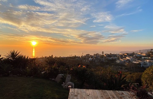 Arch Beach Heights House | Serene Oasis: Modern Home with Ocean Views, Garden, and Upscale Design Touches