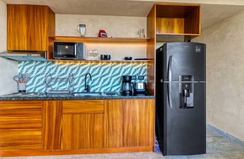 Tulsayab Apartment | Serene retreat near beaches with an amazing pool, patio, & kitchenette