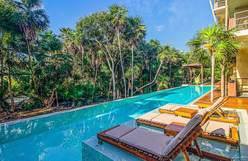 Tulsayab Apartment | Serene retreat near beaches with an amazing pool, patio, & kitchenette