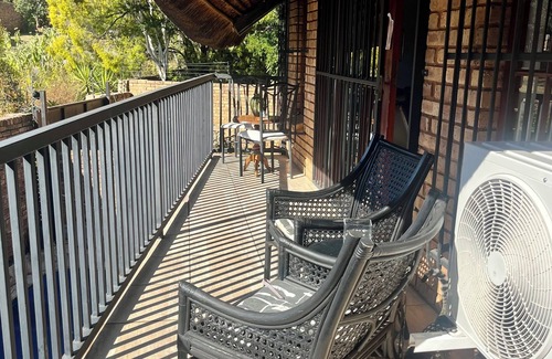 Faerie Glen Condo | Serene Thatched Roof Retreat in Faerie Glen, Pretoria