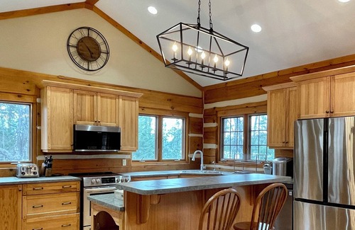 Eagle Lake Cabin | Shangri-Log: Cabin on Moose Lake with Sauna, Hot Tub, Dock