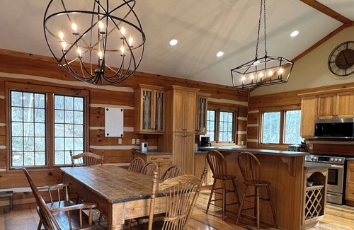Eagle Lake Cabin | Shangri-Log: Cabin on Moose Lake with Sauna, Hot Tub, Dock