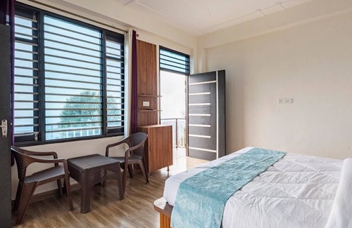 Naddi House | Sharry's Homestay A Beautiful Scenic Mountain and Sunset view.