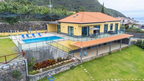 Arco da Calheta Villa | Shell House by GALMI
