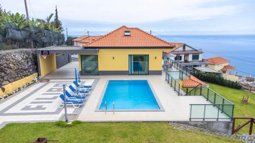 Arco da Calheta Villa | Shell House by GALMI