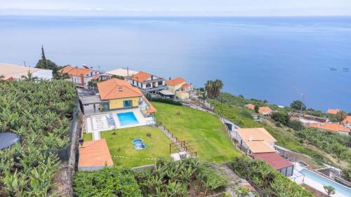 Arco da Calheta Villa | Shell House by GALMI