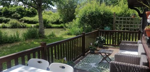 New Forest District Ski Chalet | Shorefield Lodge by the Lake