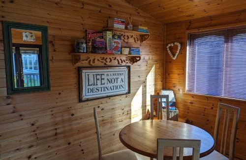 New Forest District Ski Chalet | Shorefield Lodge by the Lake