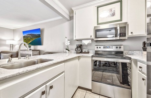 South Lake Tahoe Resort | Short Blocks from the Crystal Clear Waters of Lake Tahoe! Pets Allowed
