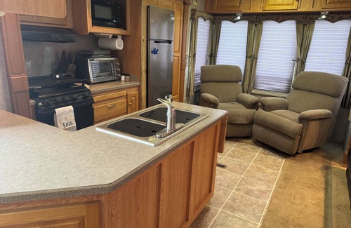 Holly Beach House | Short walk to the beach! This camper & cabin offer a perfect getaway!