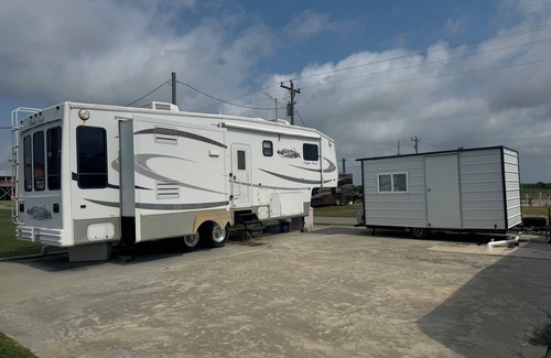 Holly Beach House | Short walk to the beach! This camper & cabin offer a perfect getaway!