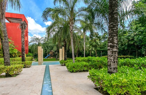 Playacar Fase II Condo | Sian Kaan by Stella Rentals