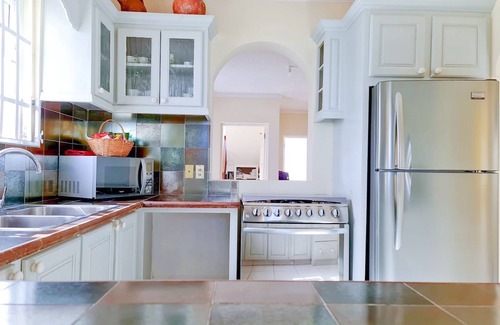 Silver Sands Apartment | Silver Sands Beachfront Condo, Indoor & Outdoor Dining, Shared Patio - Bar & BBQ