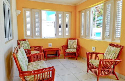 Silver Sands Apartment | Silver Sands Beachfront Condo, Indoor & Outdoor Dining, Shared Patio - Bar & BBQ