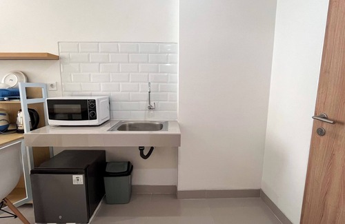 Makassar Apartment | Simply Designed Studio (No Kitchen) At Bandaraya - Tallasa City Makassar Apartment