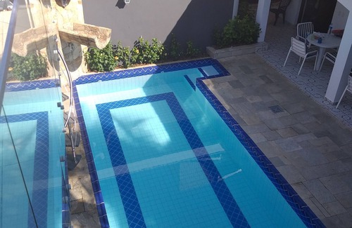 Jardim Centenario House | Single storey beach house with swimming pool and barbecue 30 meters from the beach