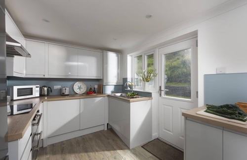 Porthtowan House | Situated only sixty meters from the Blue Flag sandy beach in the charming coastal village of Porthto