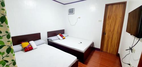 Mambajao House | SJ Pabua Travellers Inn