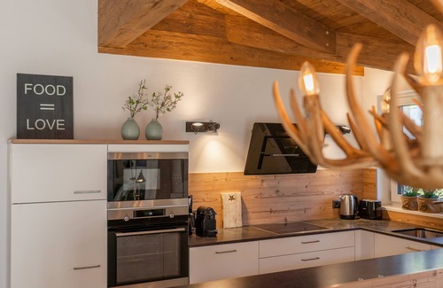 Bramberg am Wildkogel Ski Chalet | Ski-in/ski-out luxury lodge with balcony terrace sauna