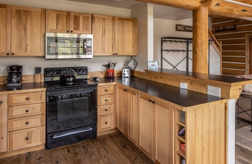 Powder Ridge House | Ski Season Availability! Charming Cabin with Ski-In/Ski-Out Access, Hot Tub, Mountain views