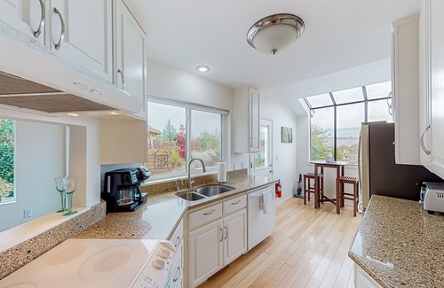 Malaga House | Skiers delight - Lakefront home with water views, outdoor areas, & W/D