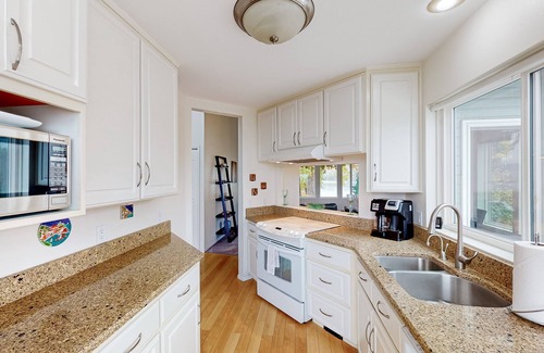 Malaga House | Skiers delight - Lakefront home with water views, outdoor areas, & W/D