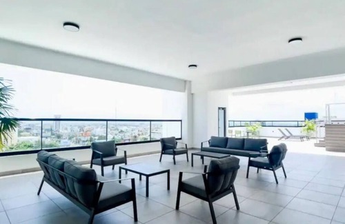 Evaristo Morales Apartment | Skyline Luxury APT 1bedroom KING size bed in Downtown Sto Dgo Rooftop POOL/GYM