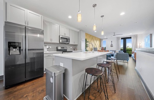 Katie Hill Neighborhood Condo | Skyline Vibes