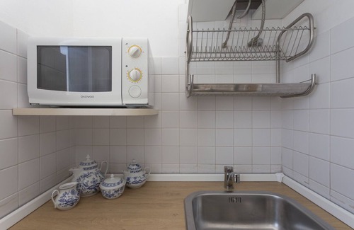 Porta Tenaglia Apartment | Skyline view Biancamano 1 bdr with balcony by Rentopolis