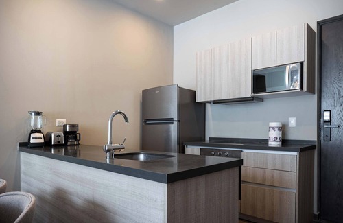 Monterrey Apartment | Sleek Apartment with Mountain views, Pool & Gym