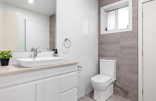Revesby House | Sleek & Comfortable Double Room at Revesby with Shared Amenities