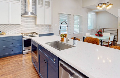 Garden Oaks House | Sleek, modern home in quiet location with fireplace, W/D, balcony, & AC