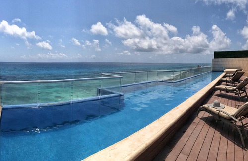 Salina Grande Condo | Sleek, Modern Oceanfront Luxury Condo, Caribbean Views!