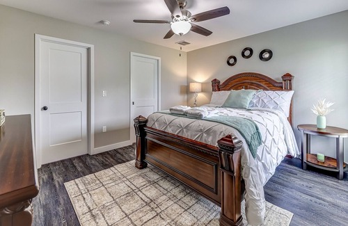 Sebring House | Sleek Serenity + Enclosed Porch in Sebring