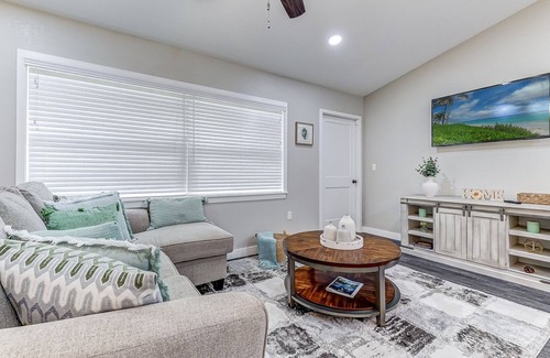Sebring House | Sleek Serenity + Enclosed Porch in Sebring