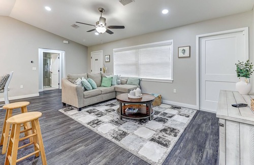 Sebring House | Sleek Serenity + Enclosed Porch in Sebring
