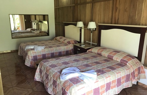 La Fortuna Hotel | Sleep VIP with Private room with Arenal Volcano views