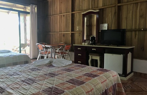 La Fortuna Hotel | Sleep VIP with Private room with Arenal Volcano views
