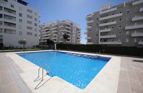 Nueva Andalucia Apartment | Sleeps 8 adults + 2 children Aircon TV Swimming pool WiFi Underground parking