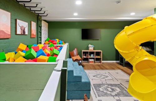 Copperwood House | Slide into Fun Pool Games Fire Pit Sport Court
