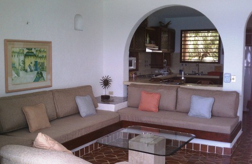 San Miguel Condo | Small is Beautiful. Relax ON the beach, convenient & near the Presidential Villa