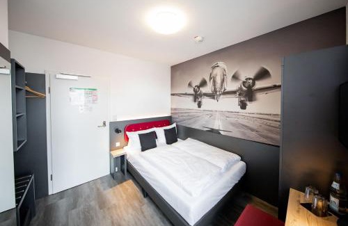 Urbach Hotel | SMARTY Airport Cologne Hotel - KONTAKTLOSER SELF CHECK-IN