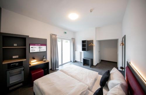 Urbach Hotel | SMARTY Airport Cologne Hotel - KONTAKTLOSER SELF CHECK-IN